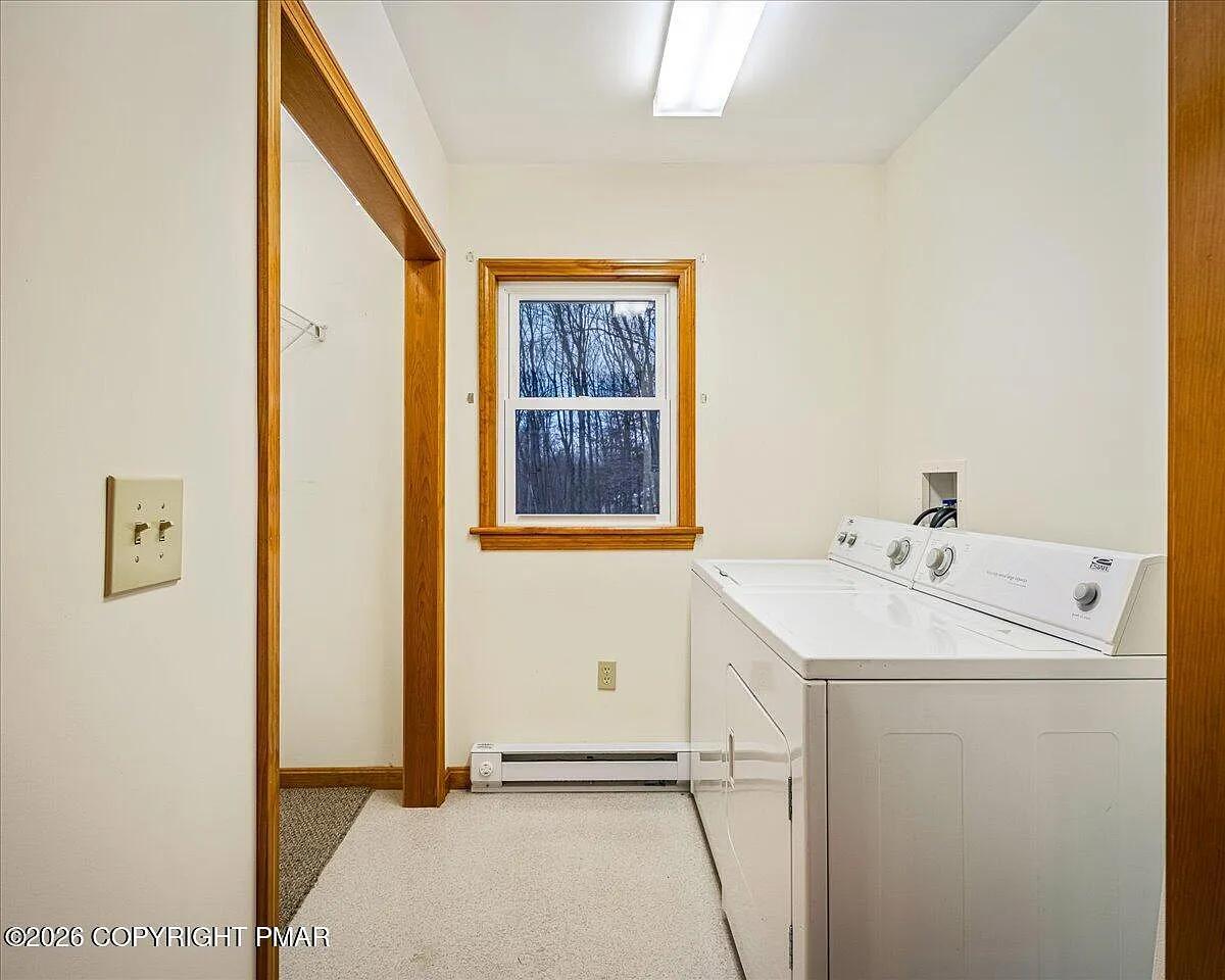 Dallas NY laundry room after — clean, functional, washer dryer in place