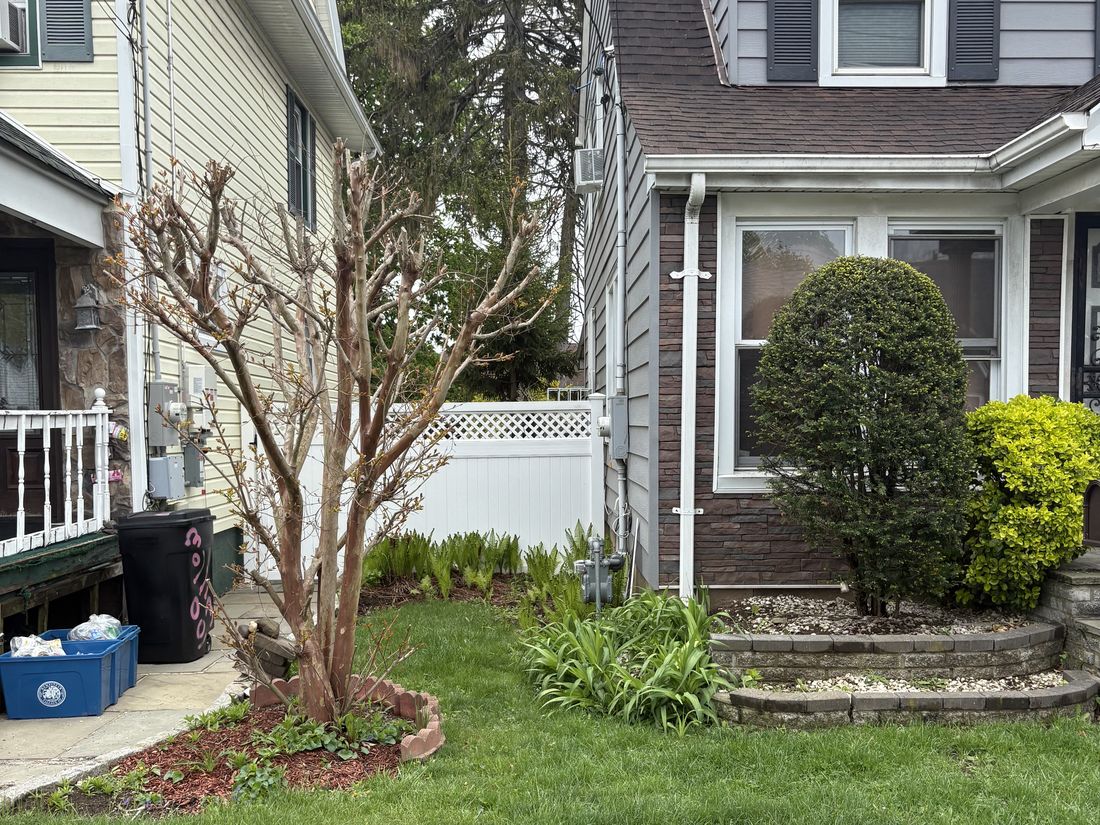 Single-family colonial in Hempstead, NY with sound roof and siding but interiors needing full renovation