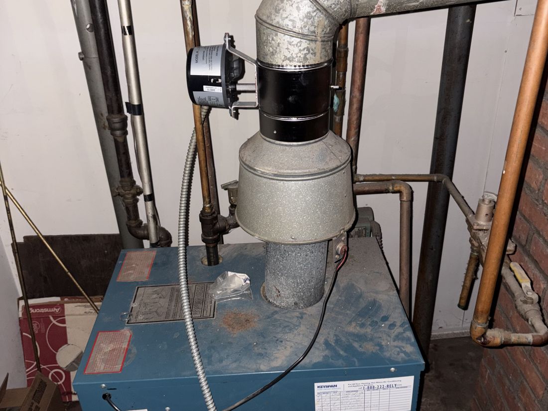 Aging furnace near the end of its service life in the Hempstead, NY basement