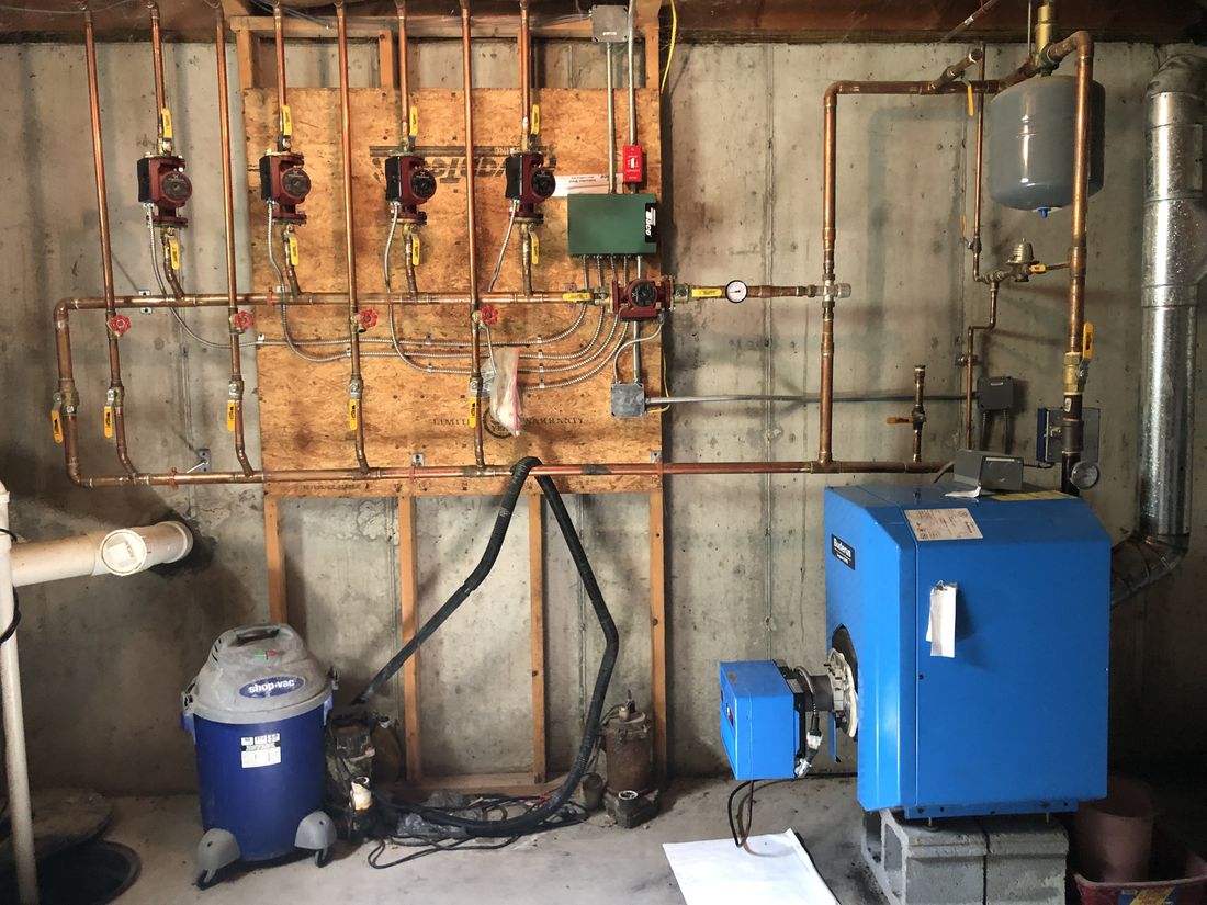 Multi-zone radiant boiler system in the basement of the Holland Patent, NY property