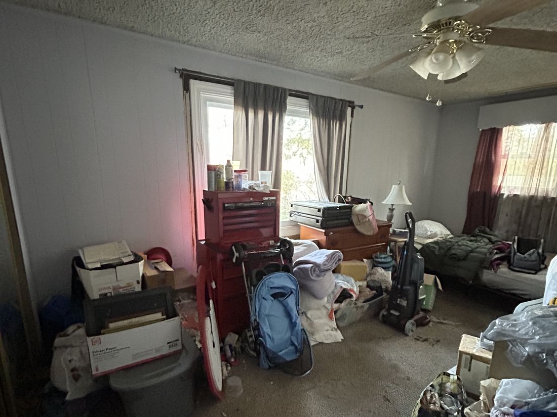 Bedroom in the West Babylon, NY ranch photographed in as-purchased condition