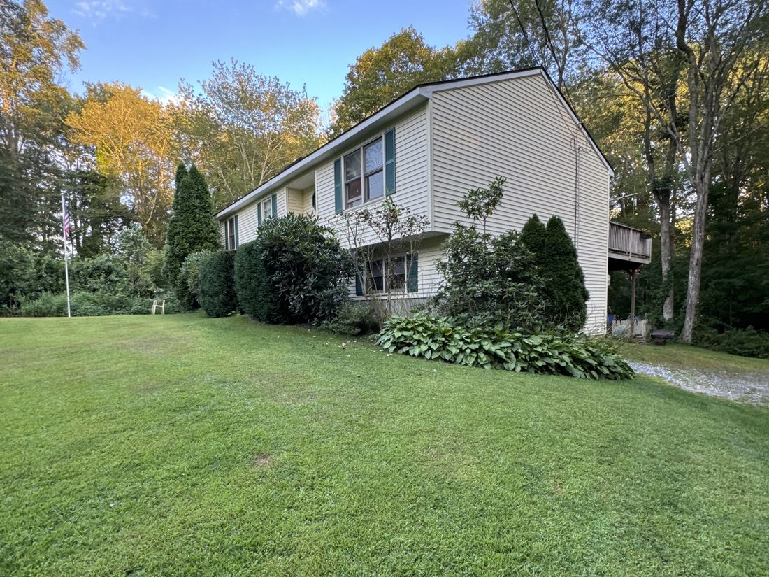 The full one-acre lot at the Yorktown Heights property, the maintenance of which had become overwhelming