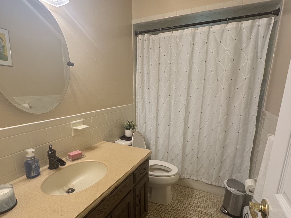 Original bathroom with dated vanity and fittings in the Yorktown Heights High Ranch